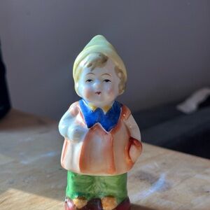 Charming Ceramic Figurine with Colorful Accents
